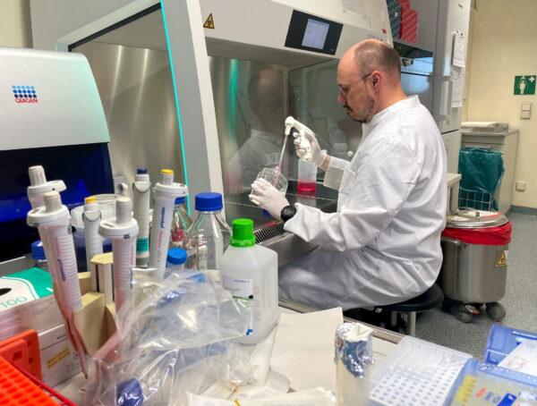 Head of the Institute of Microbiology of the German Armed Forces Roman Woelfel works in his laboratory in Munich on May 20, 2022, after Germany has detected its first case of monkeypox. (Christine Uyanik/Reuters)