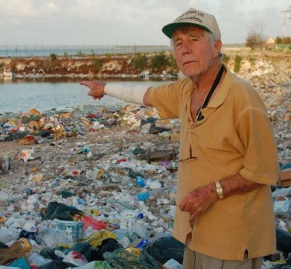 Leon Cooper points out some of the trash and dung on Tarawa in “Return to the Philippines, the Leon Cooper Story.” (Vanillafire Productions)