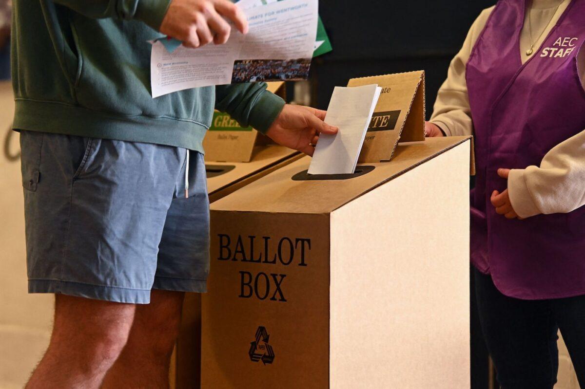 A person casts their vote during Australia's general election at a polling station at Bondi Beach in Sydney on May 21, 2022. (Steven Saphore/AFP via Getty Images)