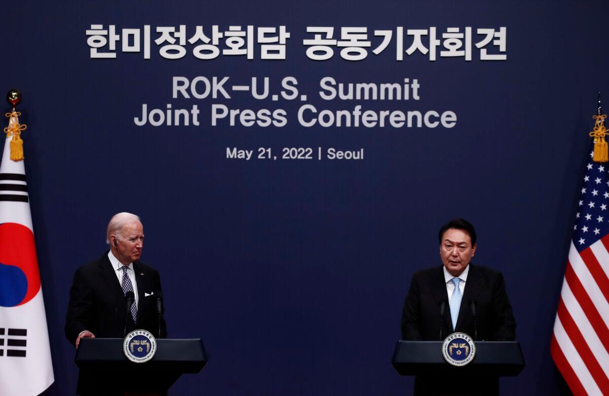 South Korean President Yoon Suk-yeol (R) speaks as U.S. President Joe Biden listens during a news press conference at the Presidential office in Seoul, South Korea, on May 21, 2022. (Jeon Heon-Kyun/Pool/Getty Images)