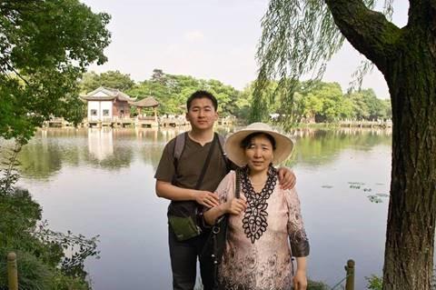 Simon Zhang, a New York architect, and his mother, Ji Yunzhi, a Falun Gong practitioner who was taken from her home three days prior to the opening of the Beijing Winter Olympics and died 48 days later in police custody. (Courtesy of Simon Zhang)