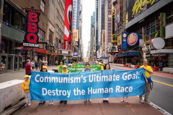 Falun Gong practitioners take part in a parade marking the 30th anniversary of the spiritual discipline's introduction to the public, in New York on May 13, 2022. (Samira Bouaou/The Epoch Times)