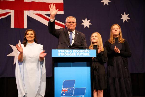Outgoing Australian Prime Minister Scott Morrison, flanked by his wife Jenny Morrison and daughters Lily Morrison and Abbey, concedes defeat following the results of the Federal Election during the Liberal Party election night event at the Fullerton Hotel in Sydney, Australia, on May 21, 2022. (Asanka Ratnayake/Getty Images)