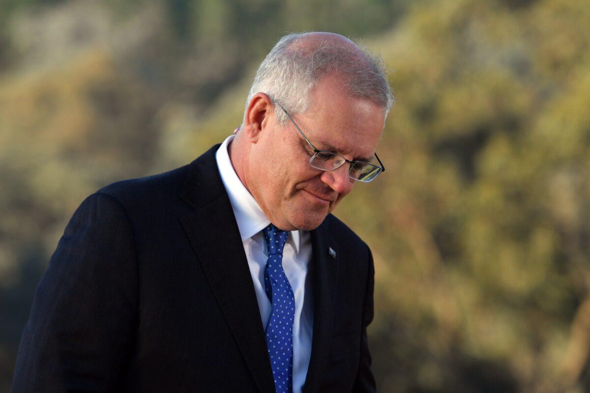 Prime Minister Scott Morrison conducts morning television interviews on Federal Election day in the seat of McEwen in Melbourne, Australia, on May 21, 2022. (Mick Tsikas/Pool/AAP Image)