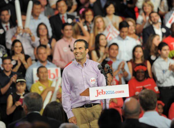 George P. Bush campaigns for his father Jeb Bush during the 2016 presidential election cycle, in Miami on June 15, 2015. (Andrew PATRON/AFP via Getty Images)