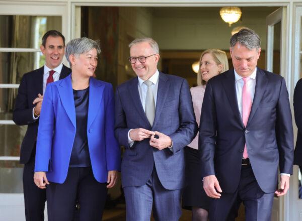 Anthony Albanese (C), Penny Wong (L) and Richard Marles (R) walk out of Government House after being sworn in as prime minister, foreign minister, and deputy prime minister, respectively, in front of the Governor-General, His Excellency General the Honourable David Hurley AC DSC (Retd) in Canberra, Australia, on May 23, 2022. (David Gray/Getty Images)