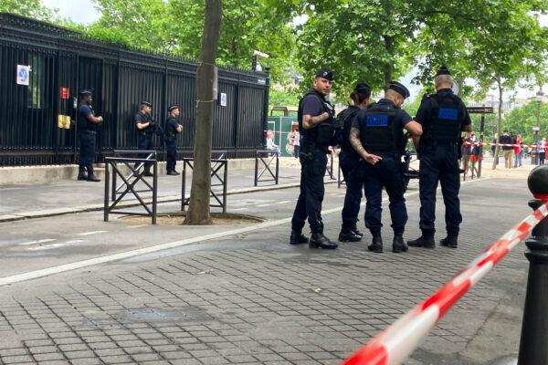 Police officers guard the entrance of the Qatar embassy in Paris, on May 23, 2022. (Alexander Turnbull/AP Photo)