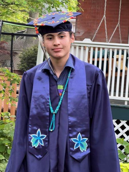 Nimkii Curley in his graduation regalia, May 22, 2022, Evanston, Ill. (Courtesy of Megan Bang)