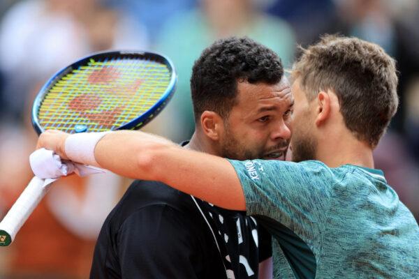 France's Jo-Wilfried Tsonga reacts after playing his final match before retiring, after losing his first round match against Norway's Casper Ruud at the French Open in Roland Garros stadium in Paris on May 24, 2022. (Gonzalo Fuentes/Reuters)