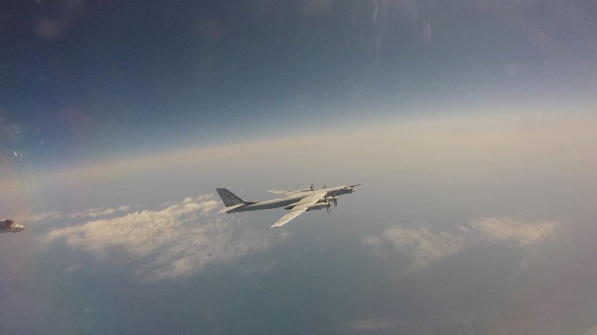 Russian Tu-95 strategic bomber flies during Russian-Chinese military aerial exercises to patrol the Asia-Pacific region, at an unidentified location, in this still image taken from a video released on May 24, 2022. (Russian Defense Ministry/Handout via Reuters)