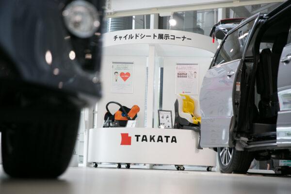 A Takata Corp. logo on a display of child safety seats at a car showroom in Tokyo, on June 26, 2017. (Christopher Jue/Getty Images)