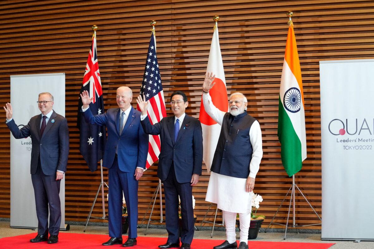 (L–R) Australian Prime Minister Anthony Albanese, U.S. President Joe Biden, Japanese Prime Minister Fumio Kishida, and Indian Prime Minister Narendra Modi pose for photos at the entrance hall of the Prime Minister’s Office of Japan in Tokyo on May 24, 2022. (Zhang Xiaoyu/Pool via Reuters)