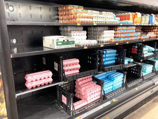 The egg shelves were about half full at Frye's Market in Cotton, Ariz., on May 23. The American Egg Bureau says avian flu has cut into about 5 percent of egg production. (Allan Stein/The Epoch Times)