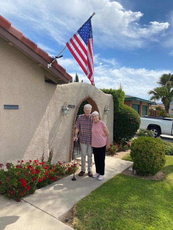 June and Bob Shelly have their U.S. flag set up thanks to Jorge Cortez, a resident of Orange, Calif., who has been supporting veteran service members by putting up U.S. flags in front of their homes since 2018. (Courtesy of Paula Zmudzinski)