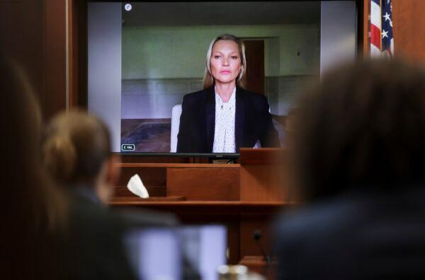 Model Kate Moss, a former girlfriend of actor Johnny Depp, testifies via video link at the Fairfax County Circuit Courthouse in Fairfax, Va., on May 25, 2022. (Evelyn Hockstein/Pool photo via AP)