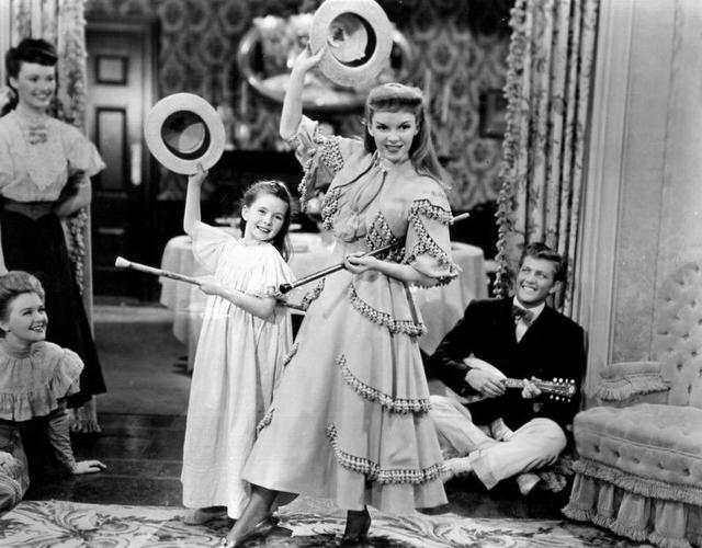 Promotional still from the 1944 film Meet Me in St. Louis, starring Judy Garland with Margaret O'Brien. (Public Domain)