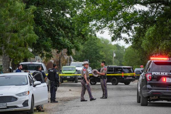 Police cordon off the scene where a man shot his grandmother before carrying out a massacre at Robb Elementary School, in Uvalde, Texas, on May 24, 2022. (Charlotte Cuthbertson/The Epoch Times)