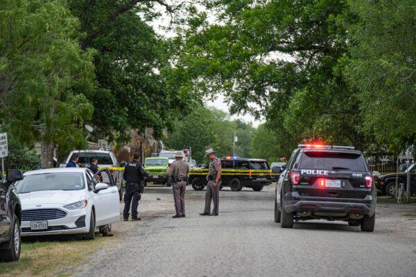 Police cordon off the scene where a man shot his grandmother before carrying out a massacre at Robb Elementary School, in Uvalde, Texas, on May 24, 2022. (Charlotte Cuthbertson/The Epoch Times)