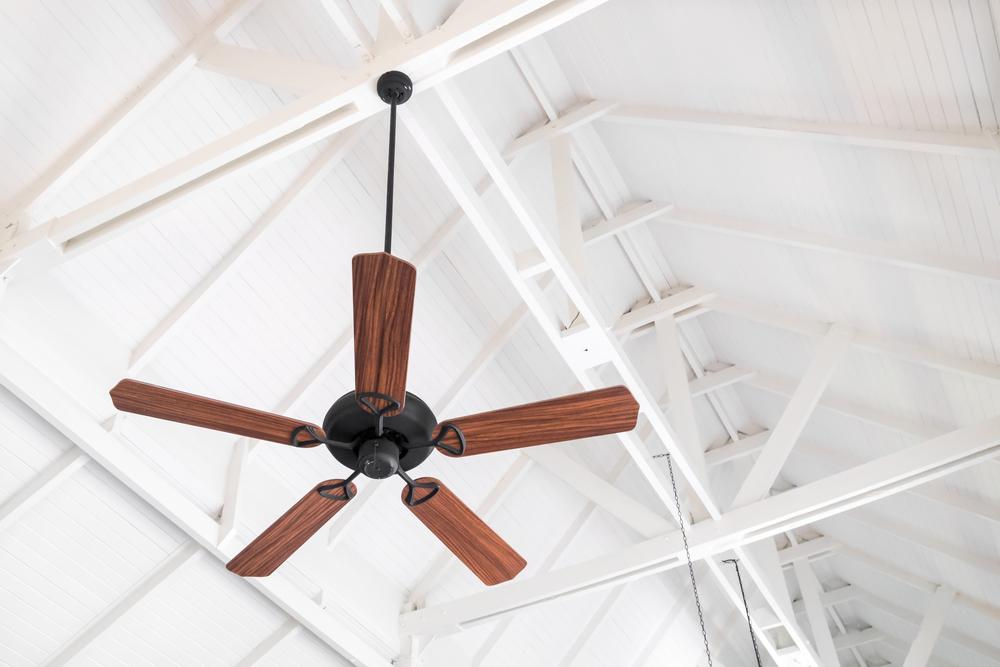 One of the easiest things to do is to switch the direction of your ceiling fans. (Byjeng/Shutterstock)