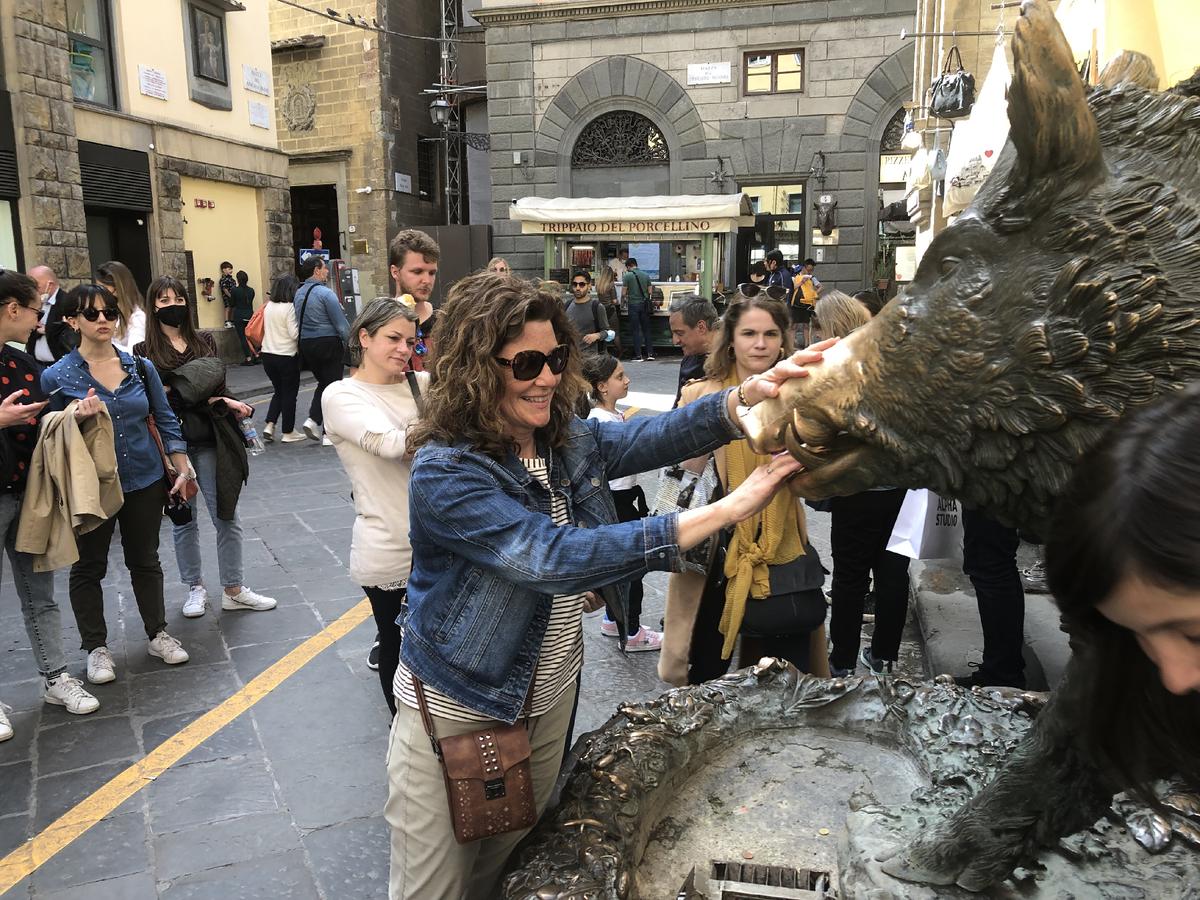 Visitors who rub the nose of Il Porcellino, a sculpture in the Mercato Nuovo in Florence, Italy, are said to be sure of a return trip. (Photo courtesy of Lesley Sauls Frederikson.)