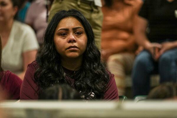 A Uvalde school student attends a community prayer evening held the day after a mass shooting at Robb Elementary School that killed 19 children and two teachers, in Uvalde, Texas, on May 25, 2022. (Charlotte Cuthbertson/The Epoch Times)