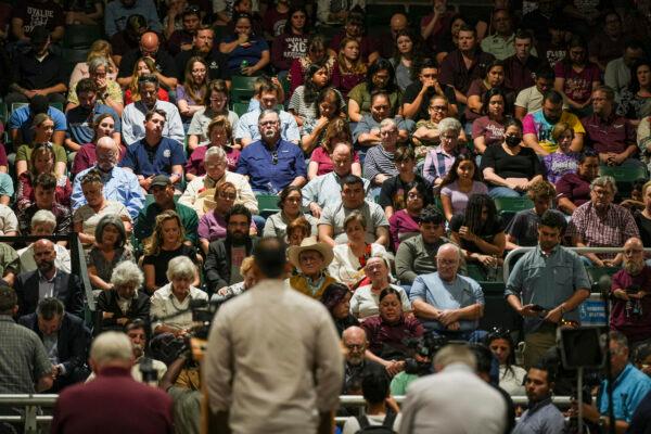 Uvalde residents attend a community prayer evening held the day after a mass shooting at Robb Elementary School that killed 19 children and 2 teachers, in Uvalde, Texas, on May 25, 2022. (Charlotte Cuthbertson/The Epoch Times)