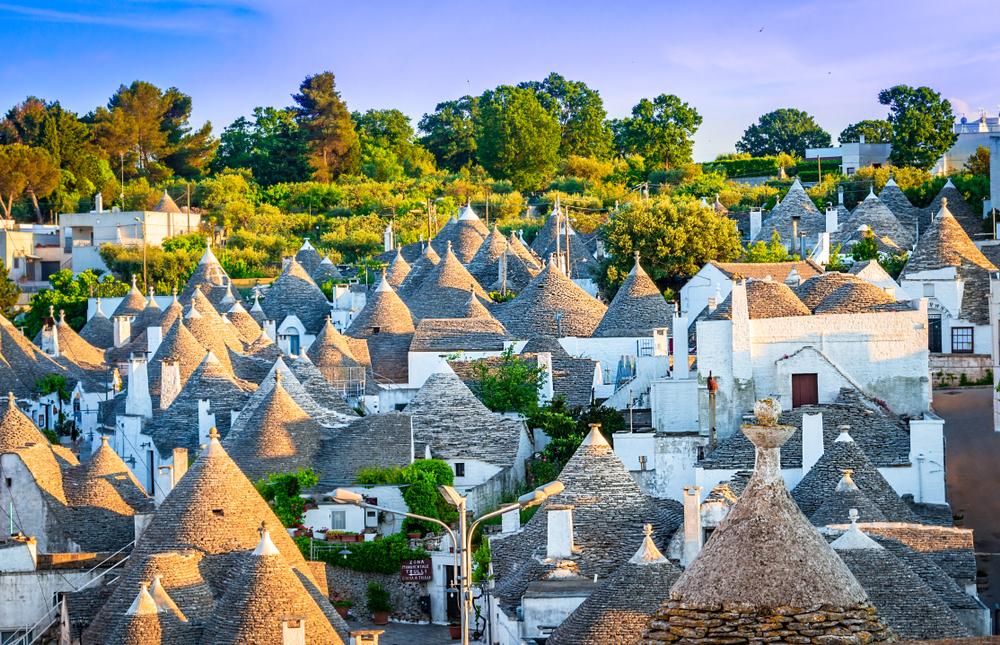 Cityscape over the traditional roofs of the "trulli," the original and old houses of this region of Puglia. (David Ionut/Shutterstock)