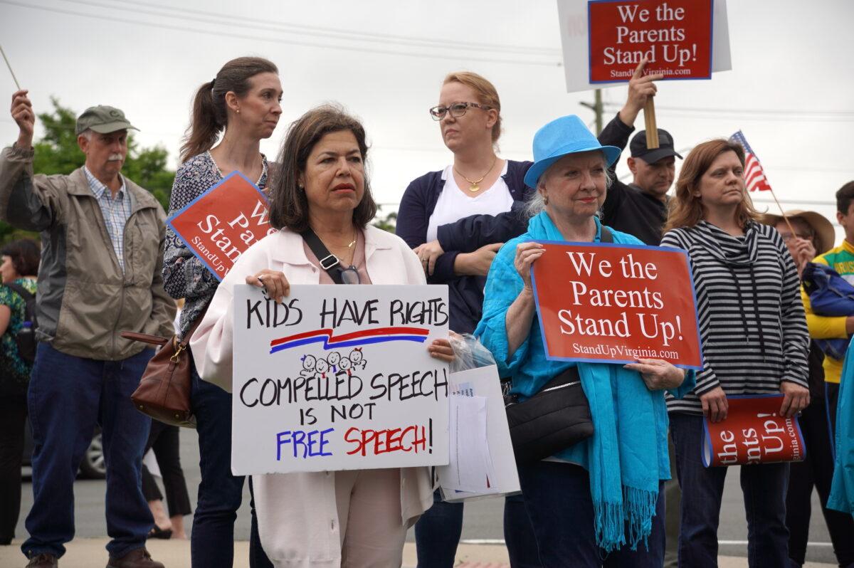 Parents protest Fairfax County Public Schools pro-transgender policies outside of the county school board meeting in Falls Church, Va., on May 26, 2022. (Terri Wu/The Epoch Times)