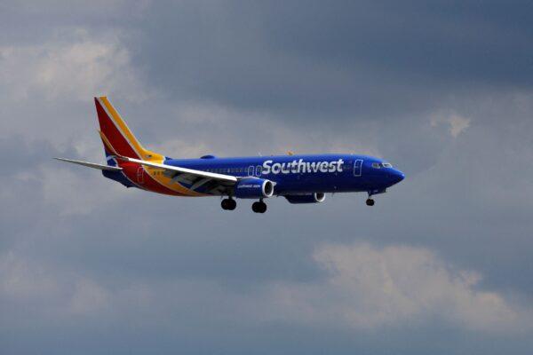 A Southwest Airlines aircraft approaches to land at John Wayne Airport in Santa Ana, Calif., on Jan. 18, 2022. (Mike Blake/Reuters)