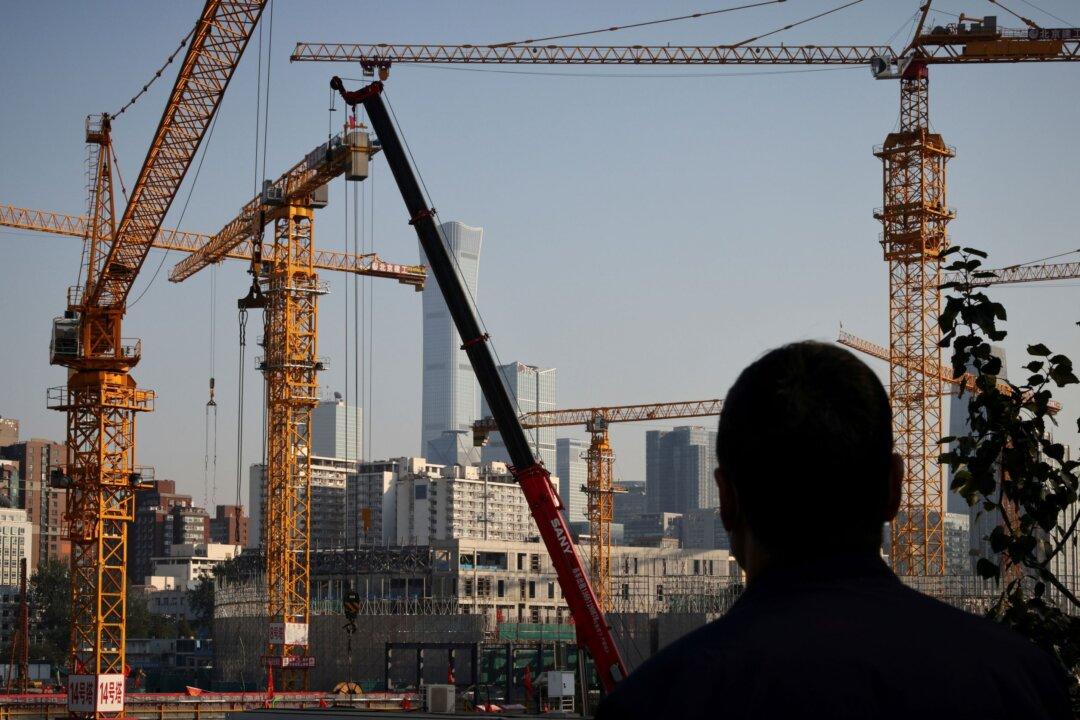 China’s Industrial Profits Slump in April as COVID-19 Curbs Squeeze Firms