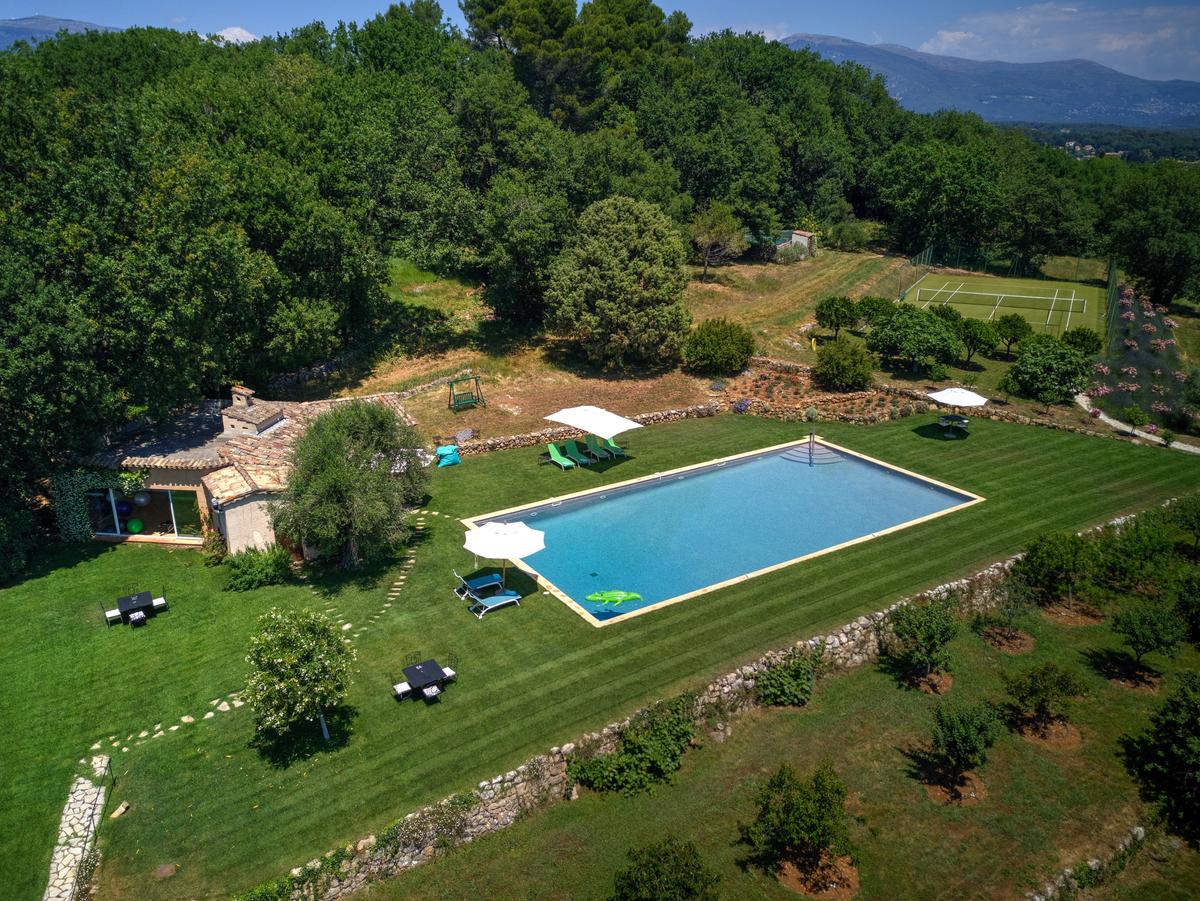 Behind the main residence is a heated pool and a poolhouse, plus tennis courts and dense woods. The estate is an ideal place for secluded relaxation, or for entertaining large groups. (The villa owners/Carlton International)