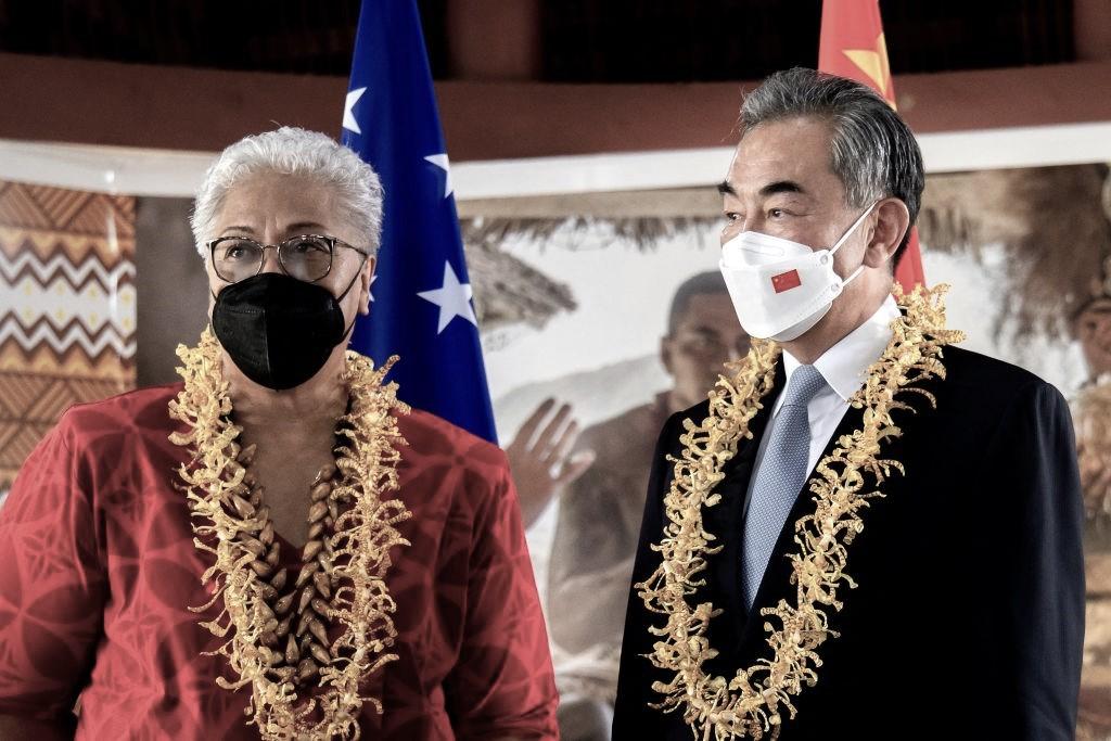 Chinese Foreign Minister Wang Yi (R) and Samoa Prime Minister Fiame Naomi Mataafa attend an agreements signing ceremony between the two countries in Apia on May 28, 2022. (Vaitogi Asuisui Matafeo/Samoa Observer/AFP via Getty Images)