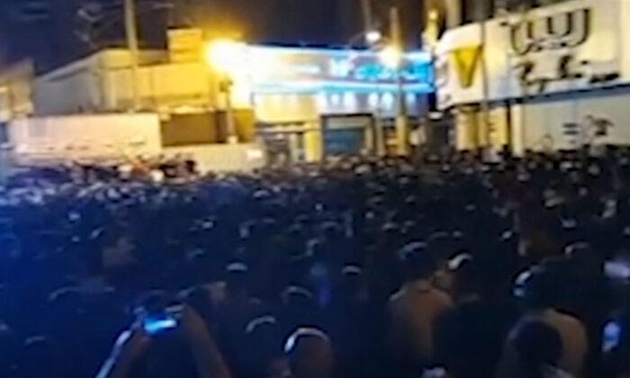 Crowd Confronts Official Over Deadly Iran Collapse