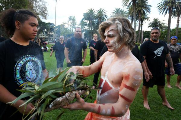 A boy of the Yaama Boys Aboriginal dance group performs a welcoming ceremony ahead of an ANZAC day service at Redfern in Sydney, Australia, on April 25, 2021. (Lisa Maree Williams/Getty Images)