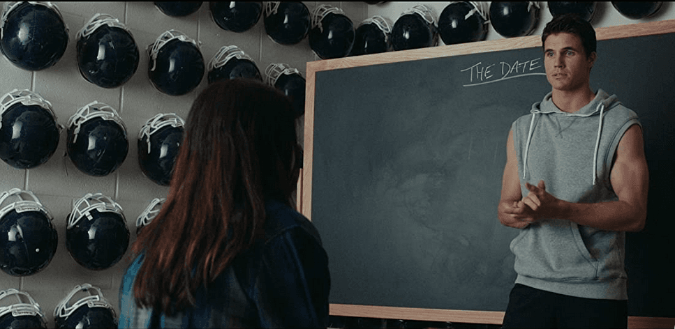 Bianca (Mae Whitman) is schooled about the state of DUFF-ness, and also how to go on a proper date, by her friend-since-childhood, high school football captain Wesley Rush (Robbie Amell), in "The DUFF." (Lionsgate/CBS Films).