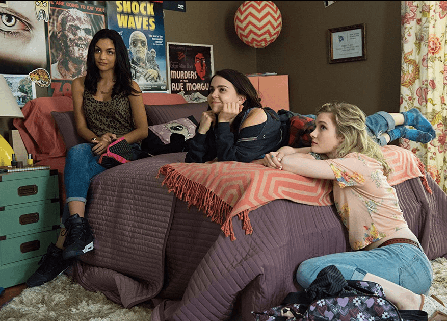 (L–R) Casey (Bianca A. Santos), Bianca (Mae Whitman), and Jess (Skyler Samuels) hanging out, in "The DUFF." (Lionsgate/CBS Films)