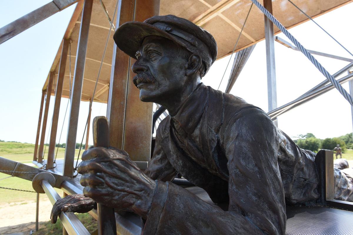 A sculpture of the Wright brothers' first flight is seen at the Wright Brothers National Memorial at Kill Devil Hills, N.C. (Jerry Jackson/The Baltimore Sun/TNS)