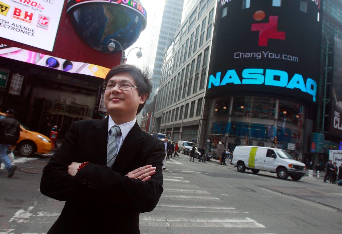 Changyou CEO Tao Wang stands outside the NASDAQ Market site after presiding over the opening bell, in New York, on April 2, 2009. (Mario Tama/Getty Images)