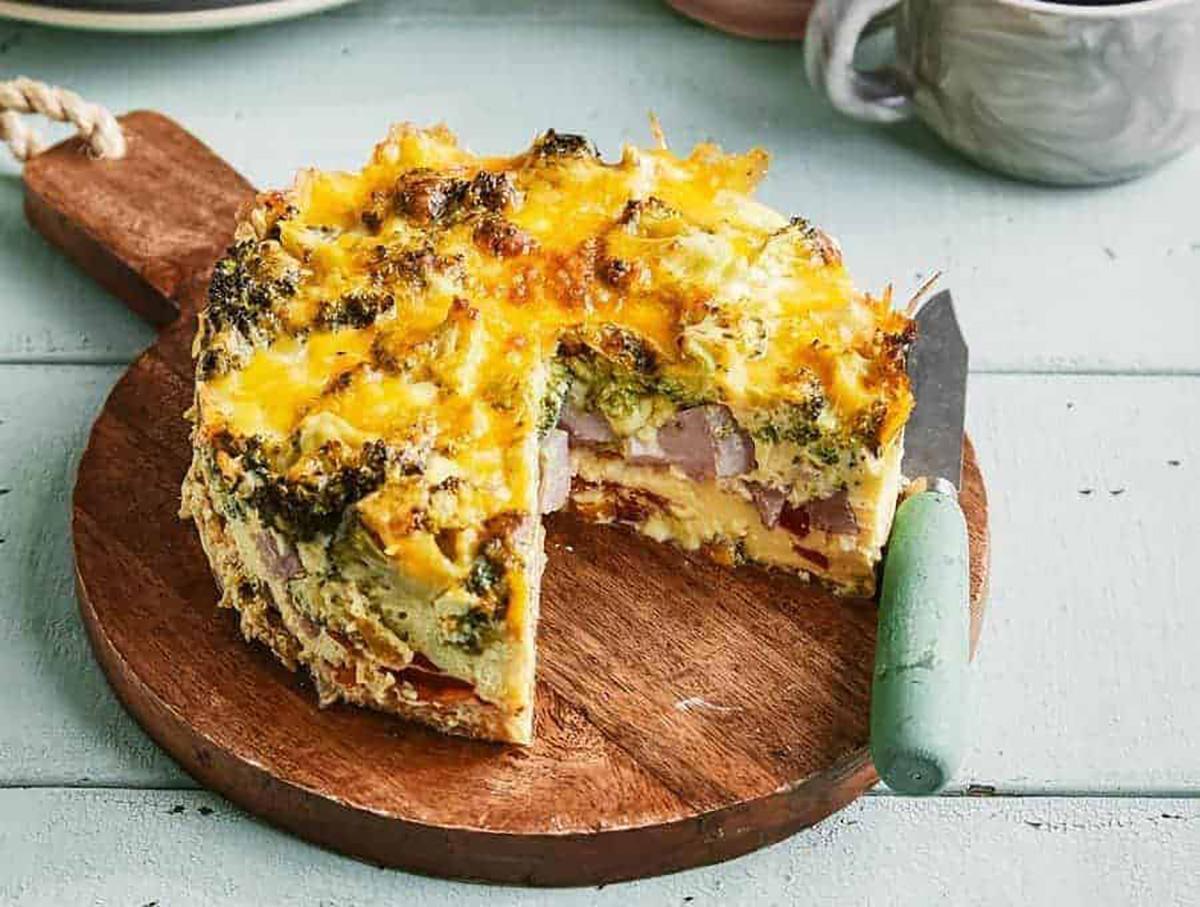 Try this l<a href="https://www.thedailymeal.com/eat/keto-holidays">ow-carb and keto-friendly</a> frittata for a quick and filling breakfast or a light brunch that still feels gourmet. Thanks to an Instant Pot, you can serve a fluffy and flavorful frittata packed with ham, melted cheese and broccoli in under an hour. (Photo courtesy of Two Sleevers) <a href="https://www.thedailymeal.com/best-recipes/instant-pot-broccoli-ham-frittata-healthy-breakfast">For the Broccoli Frittata with Ham and Peppers recipe, click here</a>.