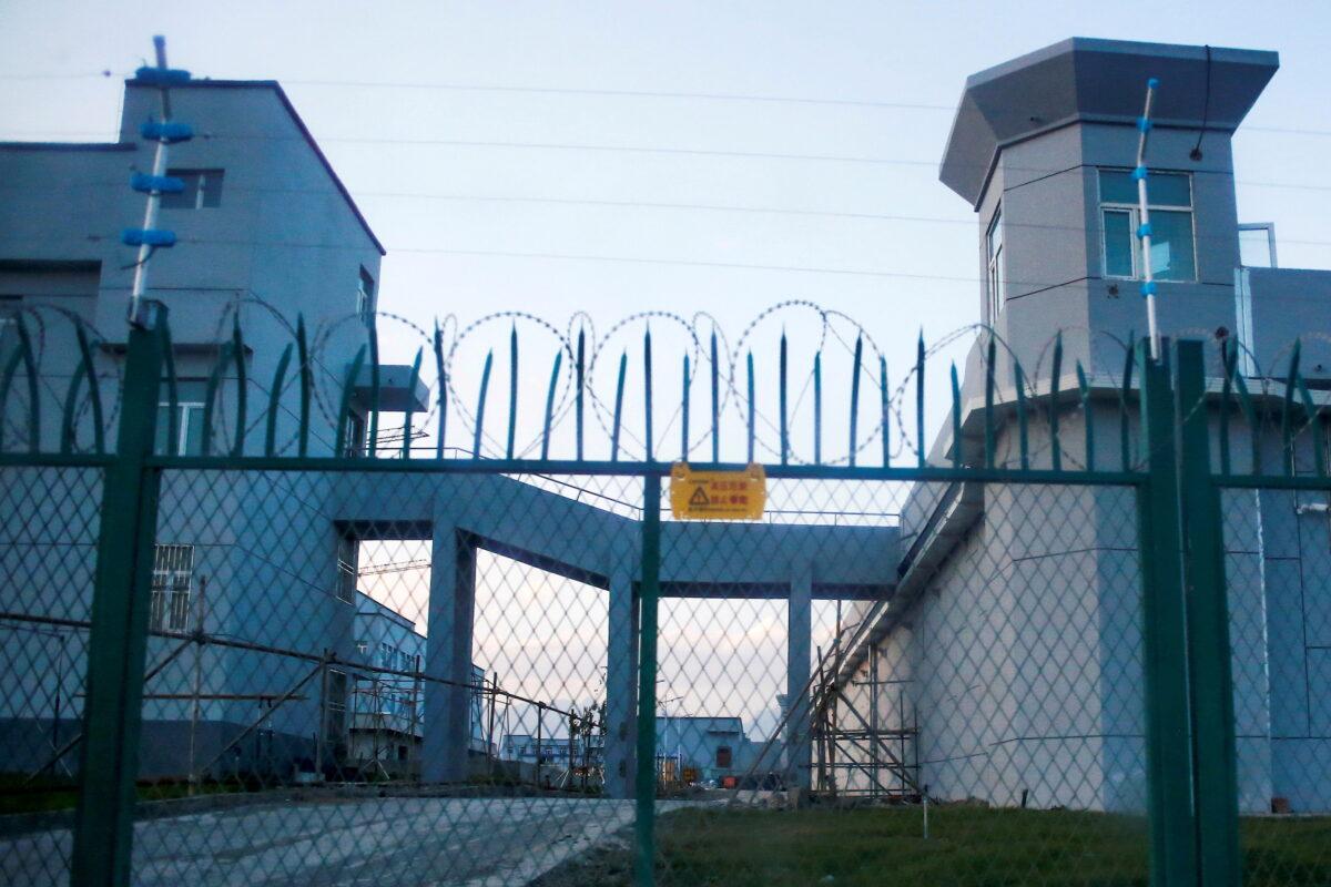 A perimeter fence surrounds a forced reeducation centre in Dabancheng, Xinjiang region, China, on Sept. 4, 2018. (Thomas Peter/Reuters)