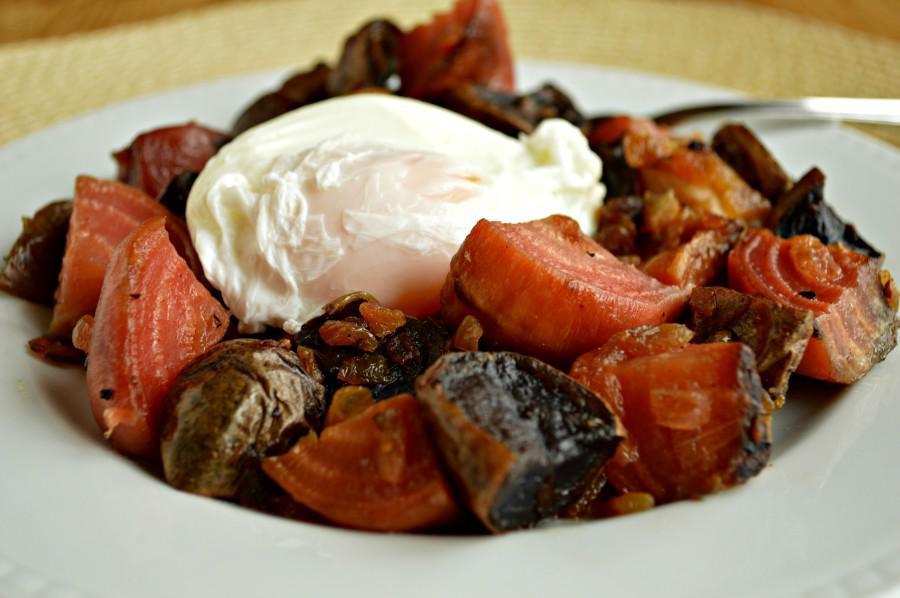 Red flannel hash is a <a href="https://www.thedailymeal.com/travel/what-people-eat-breakfast-around-world">traditional New England breakfast</a> dish made using leftovers from a boiled dinner the night before. It’s made with beets, potatoes and usually corned beef, and comes together as a speedy one-dish meal that just needs a fried or poached egg on top. (Photo courtesy of West of the Loop) <a href="https://www.thedailymeal.com/best-recipes/red-flannel-hash-poached-egg-diner-brunch">For the Red Flannel Hash with Poached Egg recipe, click here</a>.
