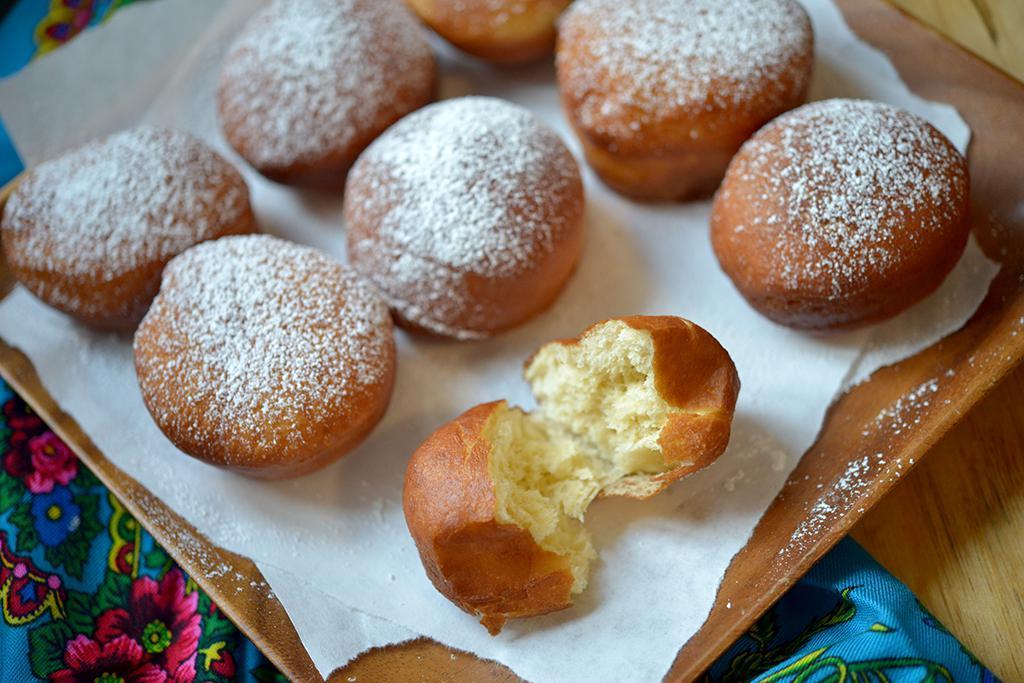 Polish doughnuts, more commonly known as paczki (pronounced ponchkee), are fried, <a href="https://www.thedailymeal.com/eat/best-doughnuts-every-state-slideshow">fluffy balls of dough</a> often filled with a fruity marmalade or custard and dusted with powdered sugar. They definitely require patience as the yeast in the dough needs time to rise, but it is absolutely worth it. (Photo courtesy of Polish Your Kitchen) <a href="https://www.thedailymeal.com/best-recipes/polish-donuts">For the Paczki recipe, click here</a>.