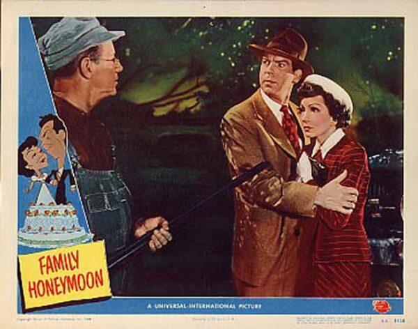 Irving Bacon (L), Fred MacMurray, and Claudette Colbert in "Family Honeymoon." (Universal Pictures)