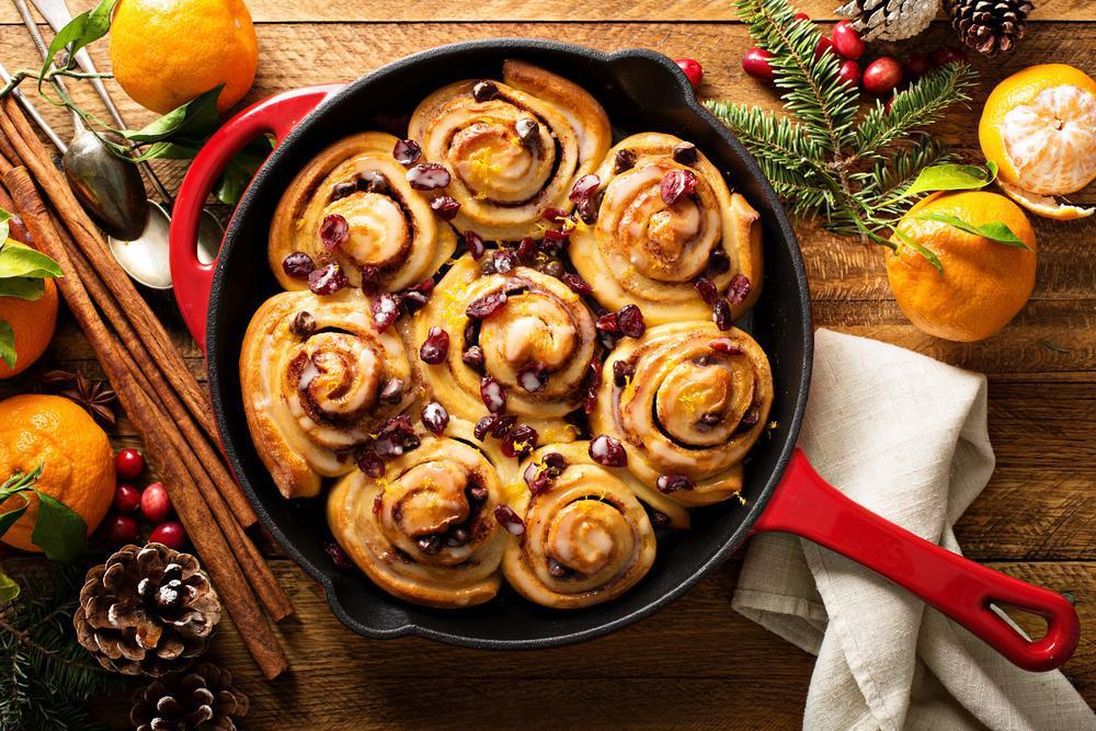 These cranberry-orange rolls will make your kitchen smell like a bakery. The rolls are studded with cranberries, pineapple, ginger and walnuts. Throw these in the oven while you brew a big pot of coffee and you’ll have brunch in no time. (Elena Veselova/Shutterstock) <a href="https://www.thedailymeal.com/recipes/bejeweled-cranberry-orange-rolls">For the Cranberry Orange Rolls recipe, click here.</a>