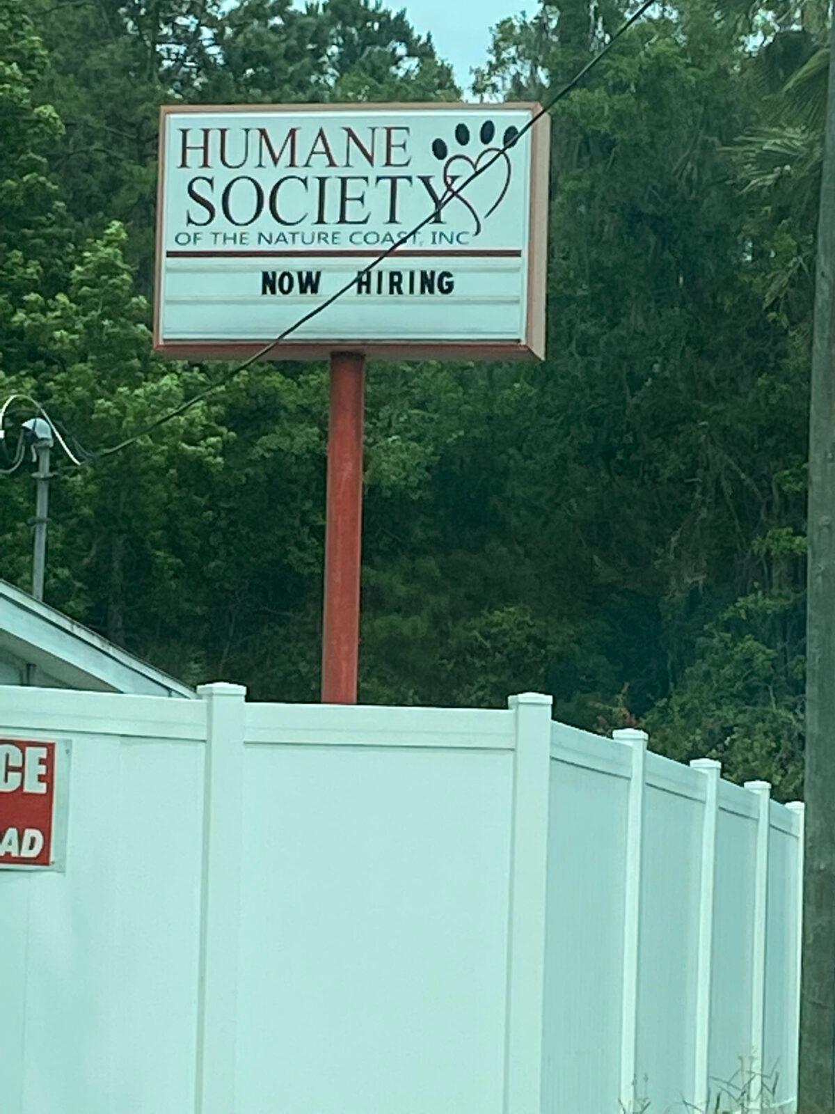 The sign at the Humane Society of the Nature Coast in Brooksville, Fla., announces they are hiring on May 27, 2022. (Patricia Tolson/The Epoch Times)
