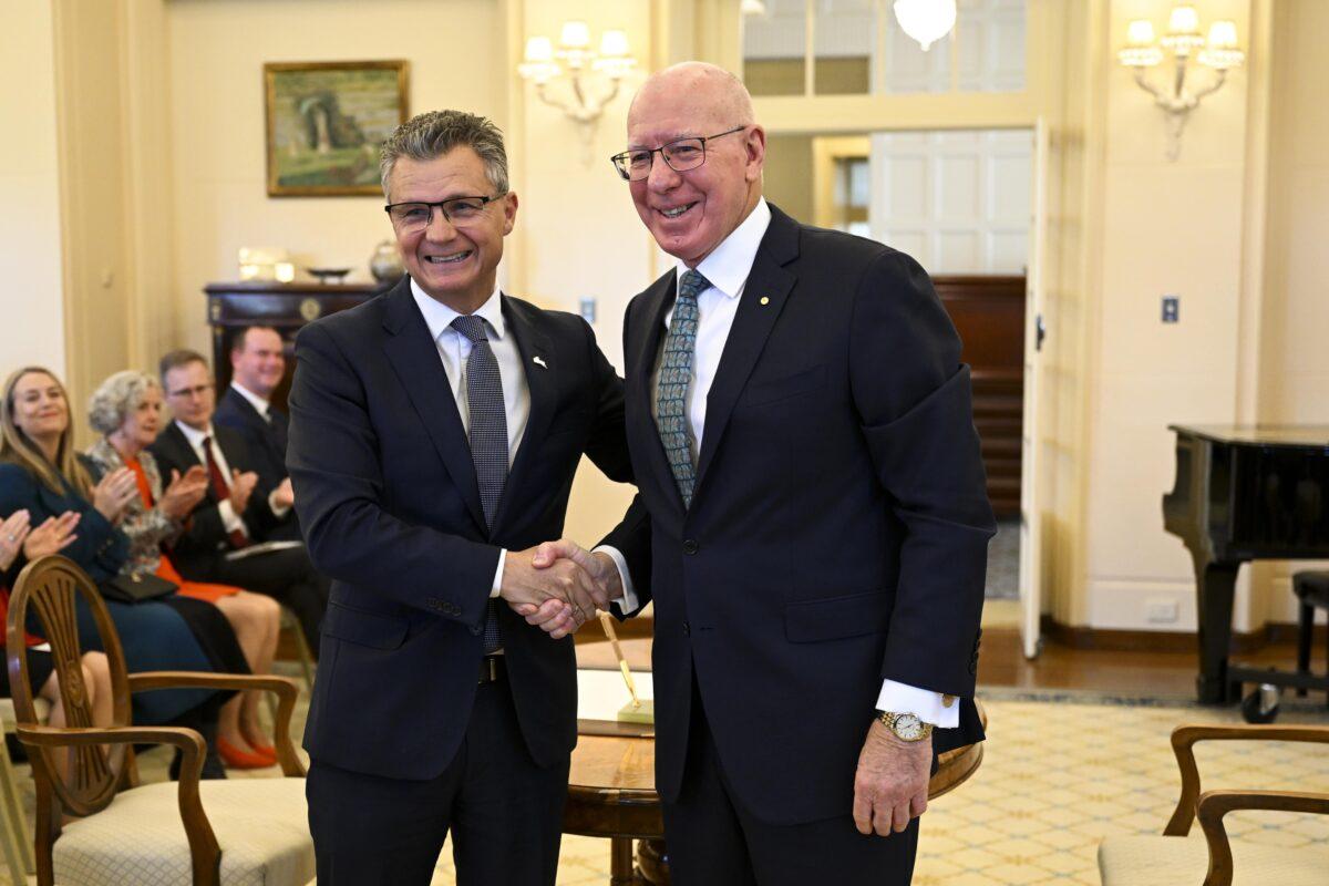 Assistant Minister for the Republic Matt Thistlethwaite shakes hands with Australian Governor-General David Hurley during a swearing-in ceremony at Government House in Canberra, Australia, on June 1, 2022. (AAP Image/Lukas Coch)