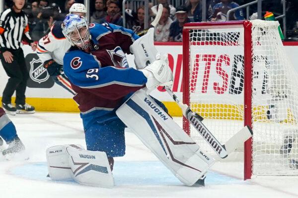  Colorado Avalanche goaltender Pavel Francouz (39) clears the puck during the second period in Game 2 of the team's NHL hockey Stanley Cup playoffs Western Conference finals against the Edmonton Oilers in Denver, on June 2, 2022. (Jack Dempsey/AP Photo)