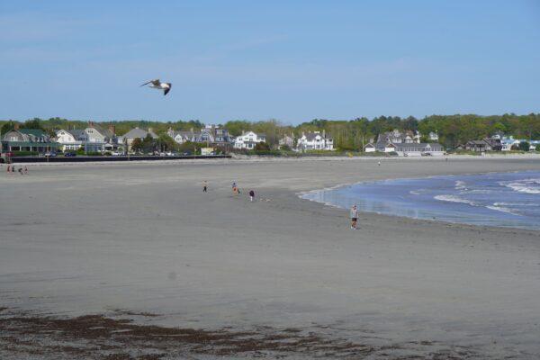 A broad, sandy, beach in the tourist region of southeastern Maine, on May 26, 2022. (Steven Kovac/The Epoch Times)