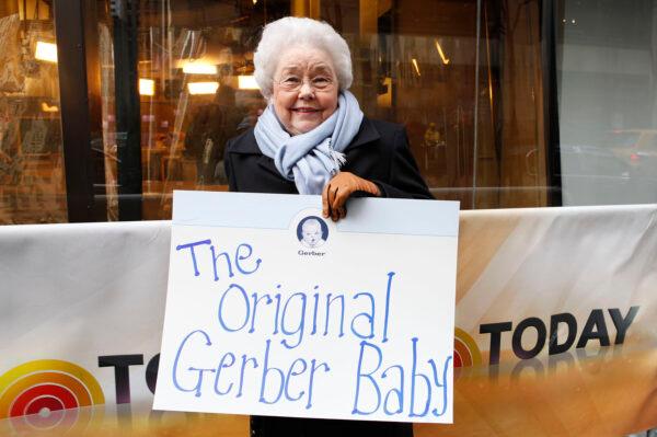 Ann Turner Cook, whose baby face launched the iconic Gerber logo, arrives at NBC's Today Show to announce the winner of the 2012 Gerber Generation Photo Search, in New York on Nov. 6, 2012. (Amy Sussman/Gerber via AP)