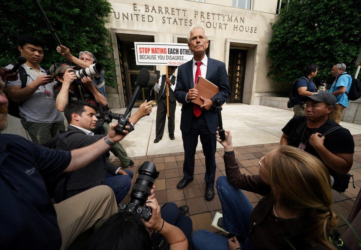 Peter Navarro, former trade adviser to President Donald Trump, speaks to reporters as he departs U.S. District Court after he was indicted on two counts of contempt of Congress for his failure to comply with a subpoena from the House of Representatives committee investigating the Jan. 6 attack on the U.S. Capitol, in Washington on June 3, 2022. (Kevin Lamarque/Reuters)